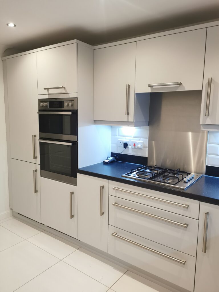 Modern Kitchen Units wrapped in CoverStyl’ Architectural Light Grey K6 - Professional Kitchen Wrap Scotland