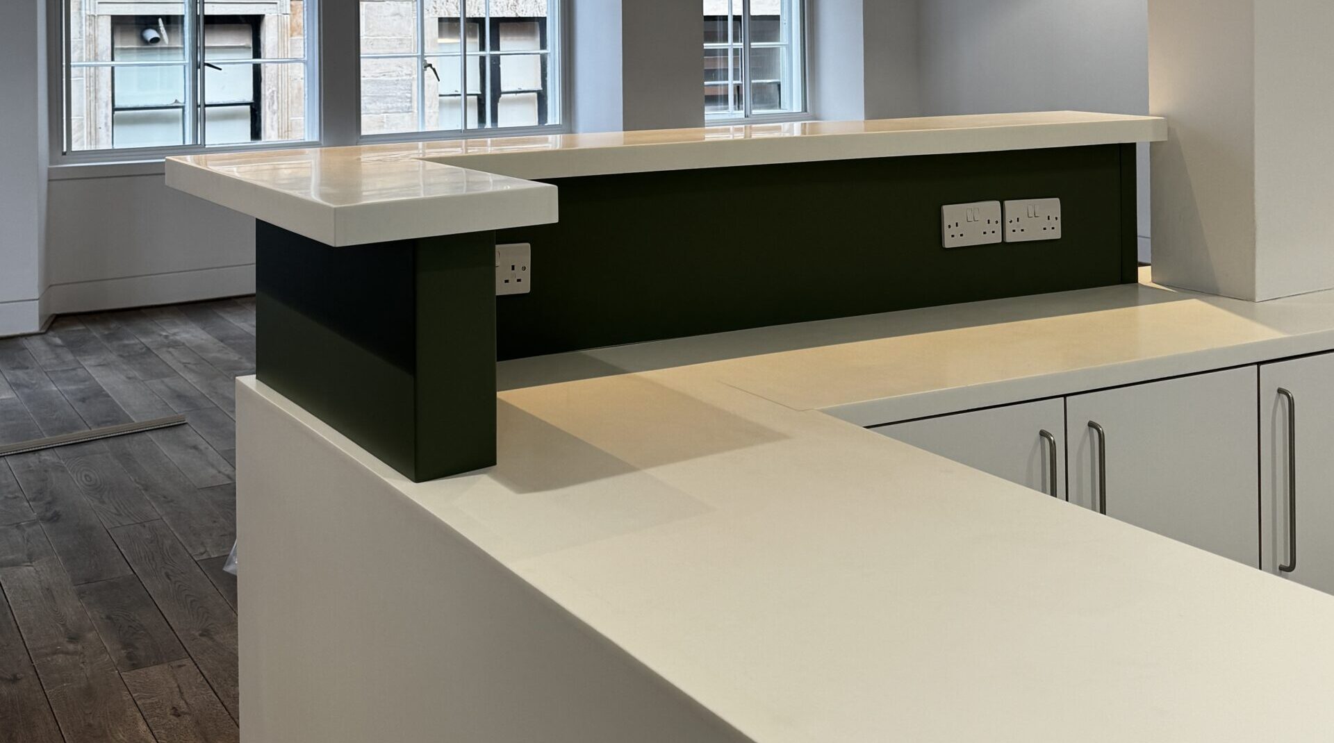Office kitchen Splashback wrapped in Bodaq Olive Green RM20 architectural vinyl – The Wrap Centre Scotland.