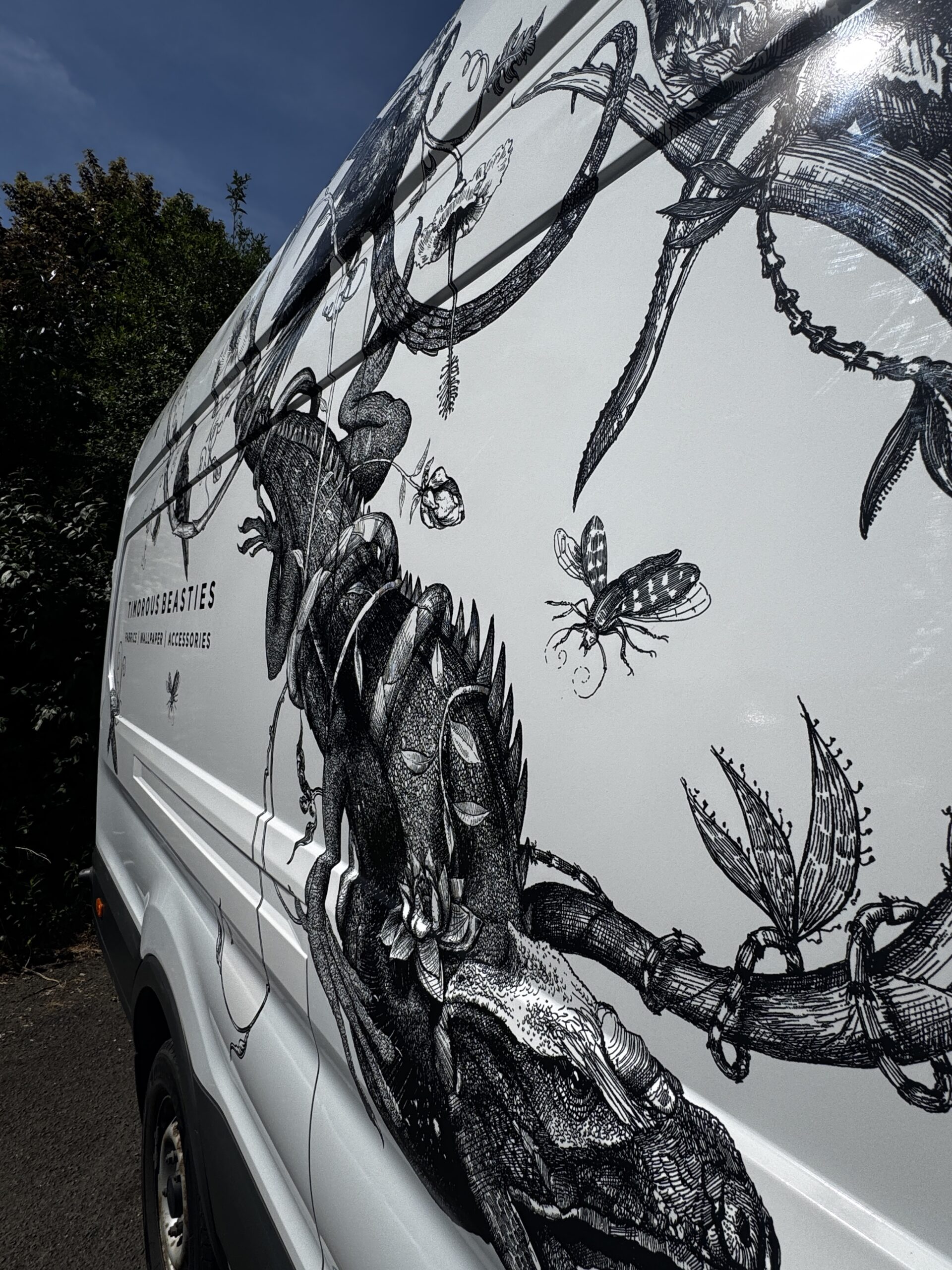 High-resolution digital print wrap featuring botanical illustration on Timorous Beasties van – Paisley Scotland.