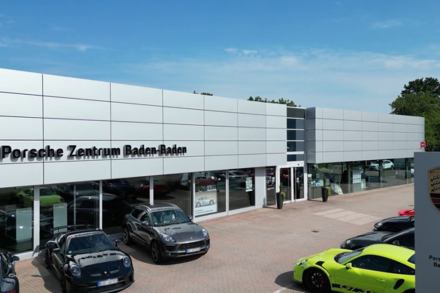 Porsche-Showroom-Window-Film-Installation-with-Spandex-and-3m-1080x675